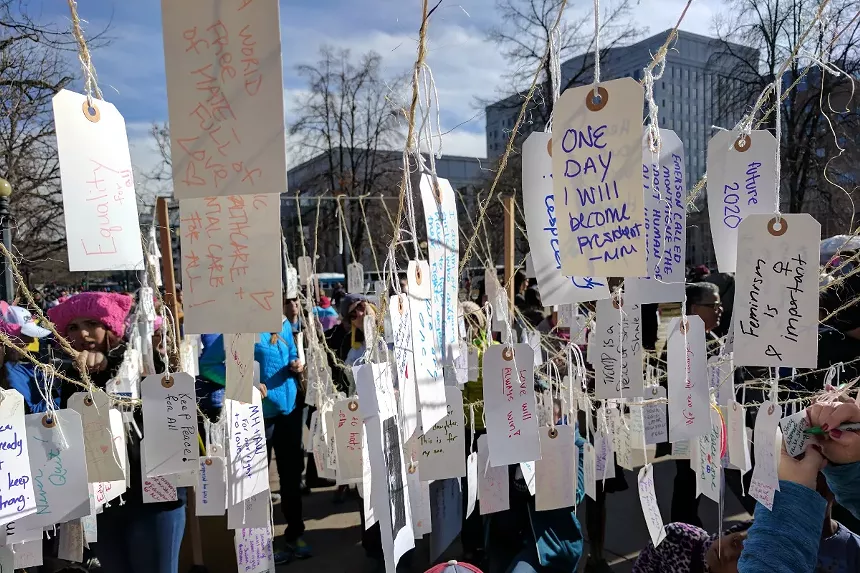 Notes hang from a string.