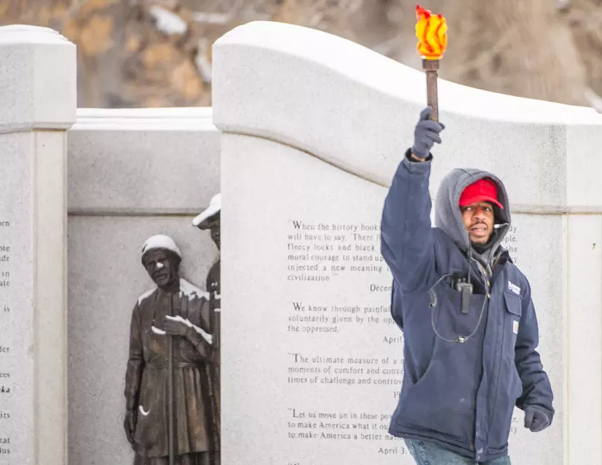 man with torch