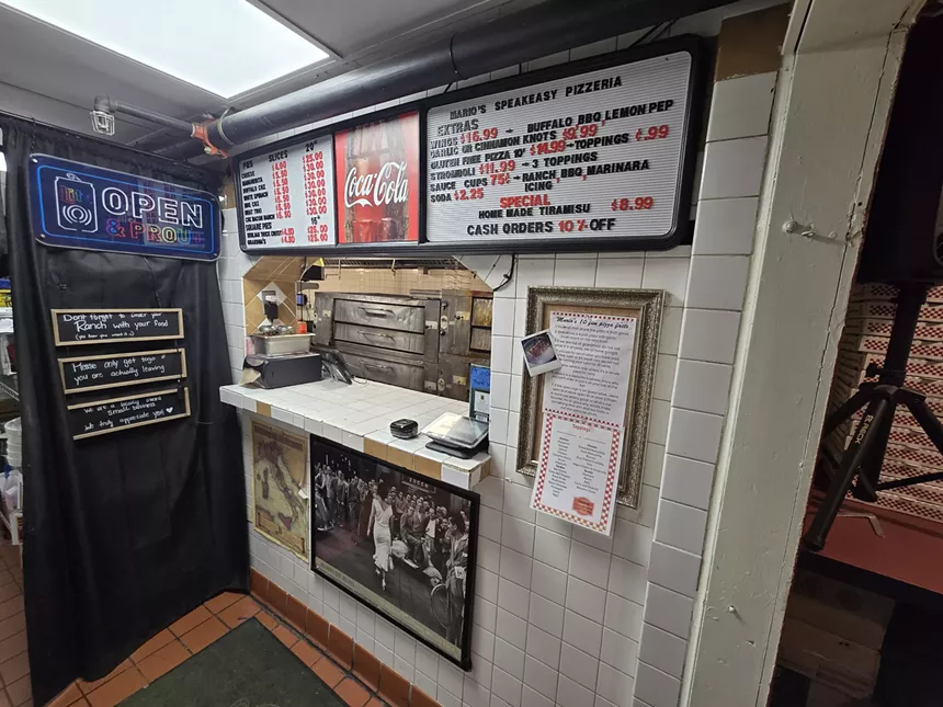 pizza window with a menu