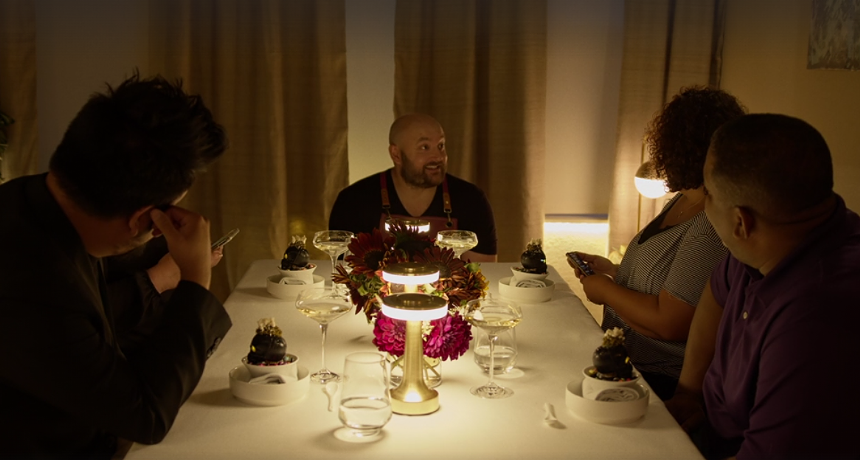 people sitting at a dining table