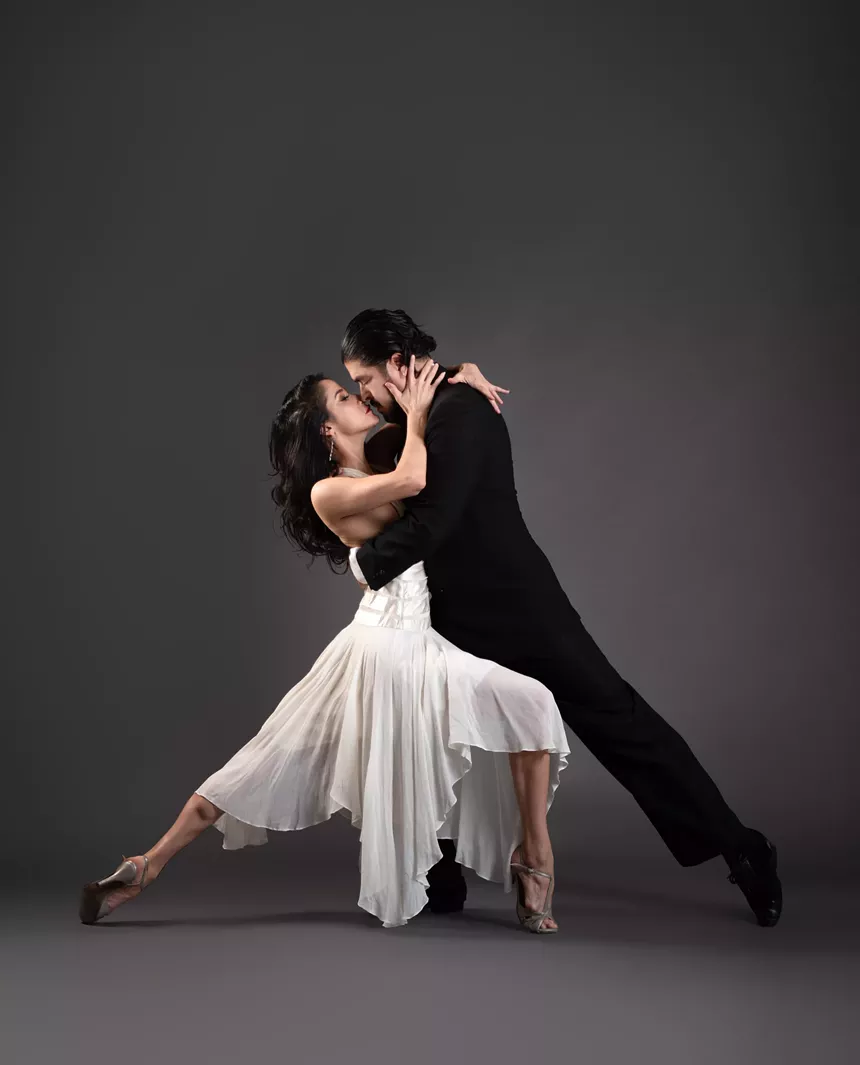 Two dancers strike a romantic pose