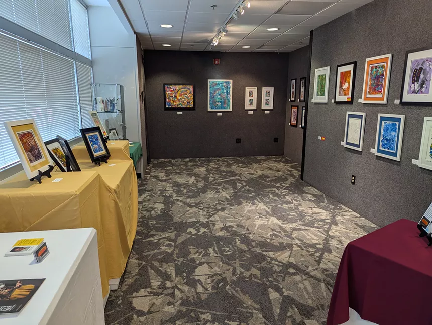 A hall with paintings hanging
