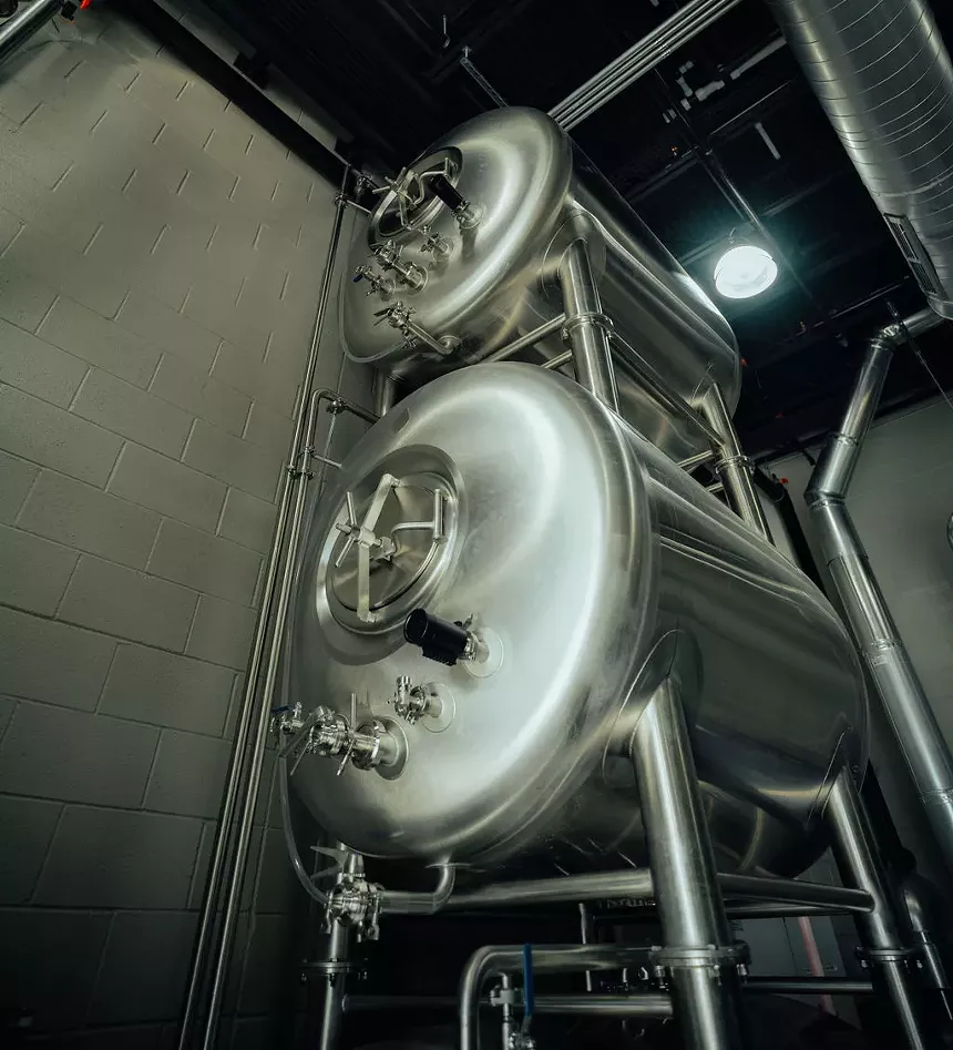 Horizontal fermenters at a brewery.