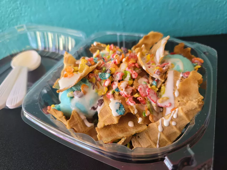 waffle cone pieces, blue ice cream and fruity pebbles