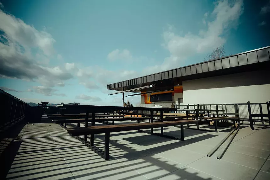 long tables on a rooftop patio