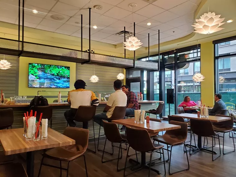 people sitting inside a restaurant