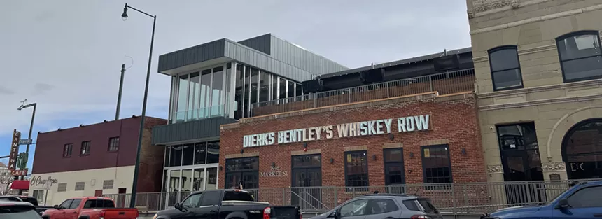 A red-bricked bar bearing the words "Dierks Bentley's Whiskey Row."