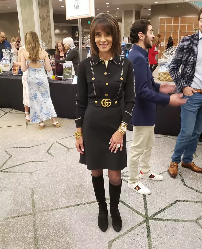 A woman in a black outfit