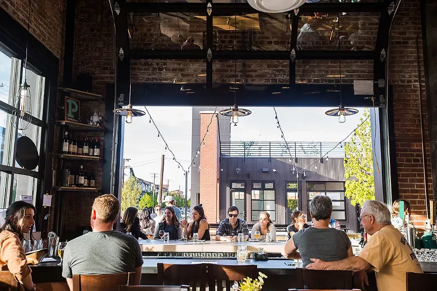 people sitting at a bar