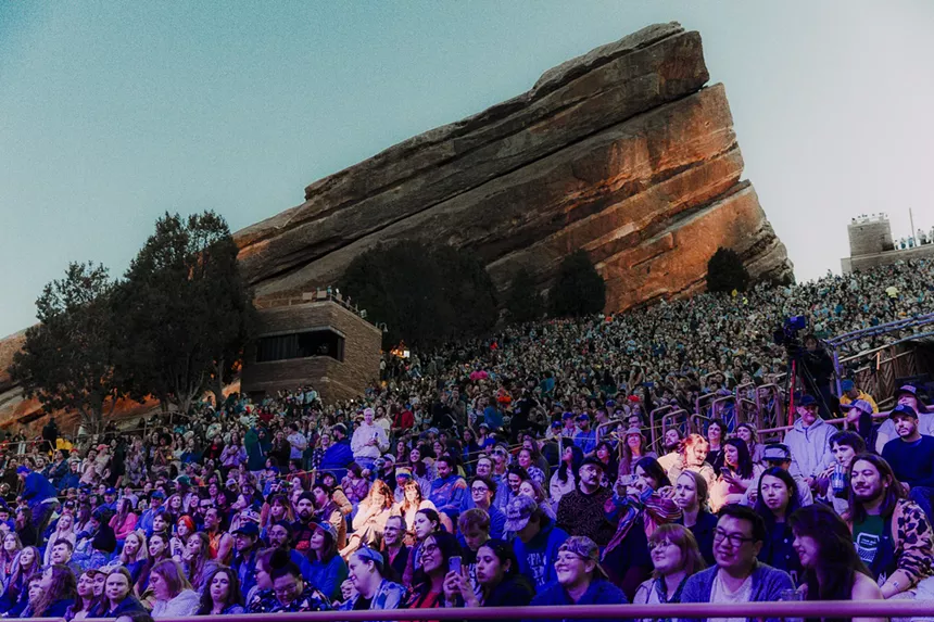 A picture of the crowd with Red Rocks in the background.