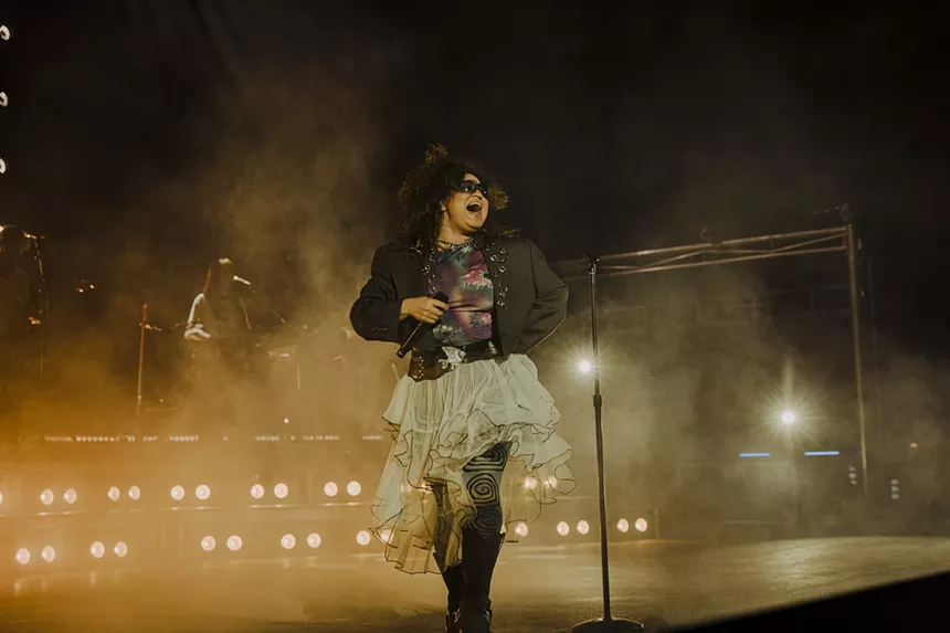 Remi Wolf dancing on stage at Red Rocks.
