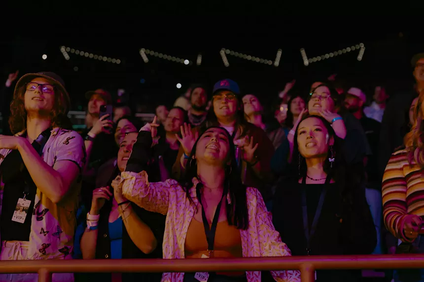 Fans singing at Red Rocks.