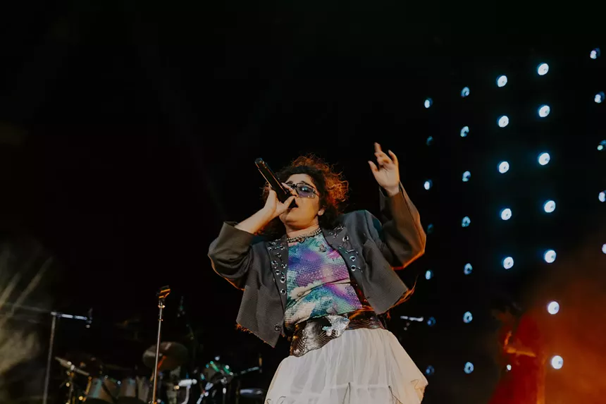 Remi Wolf singing at Red Rocks in Morrison, Colorado.