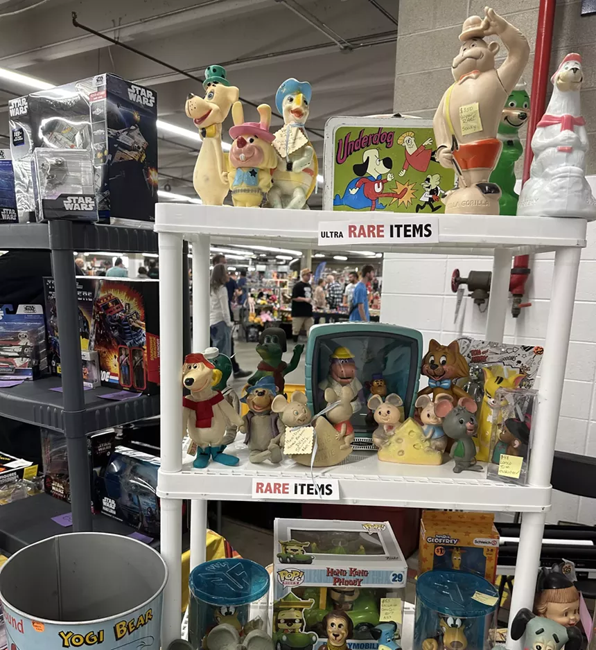 A shelf of vintage toys