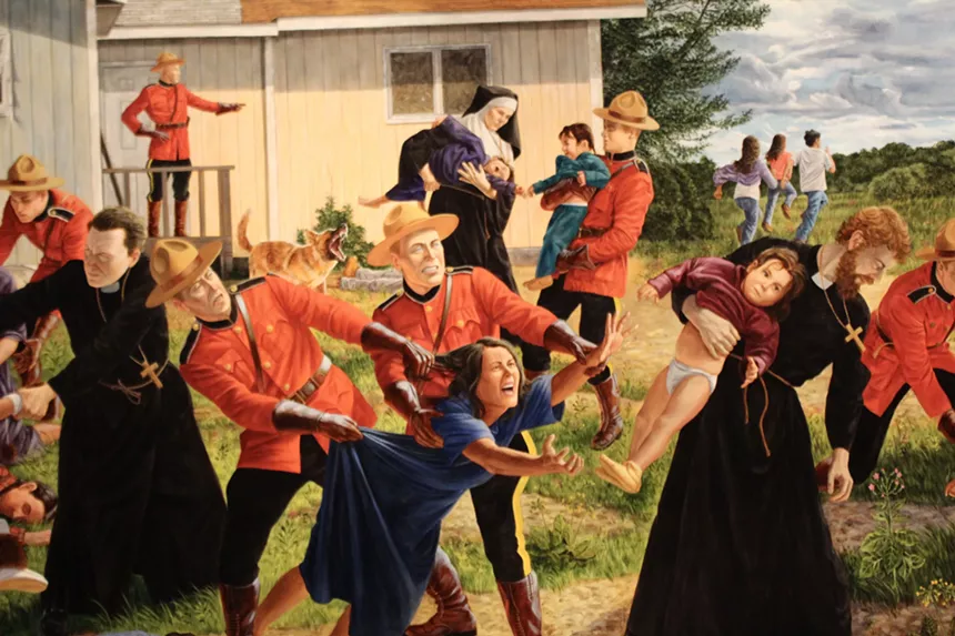 A painting that depicts Indigenous children being ripped from the arms of their wailing mothers by hard-faced soldiers and men and women in black robes, crucifixes swinging from their necks