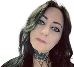 A portrait of a woman with black hair