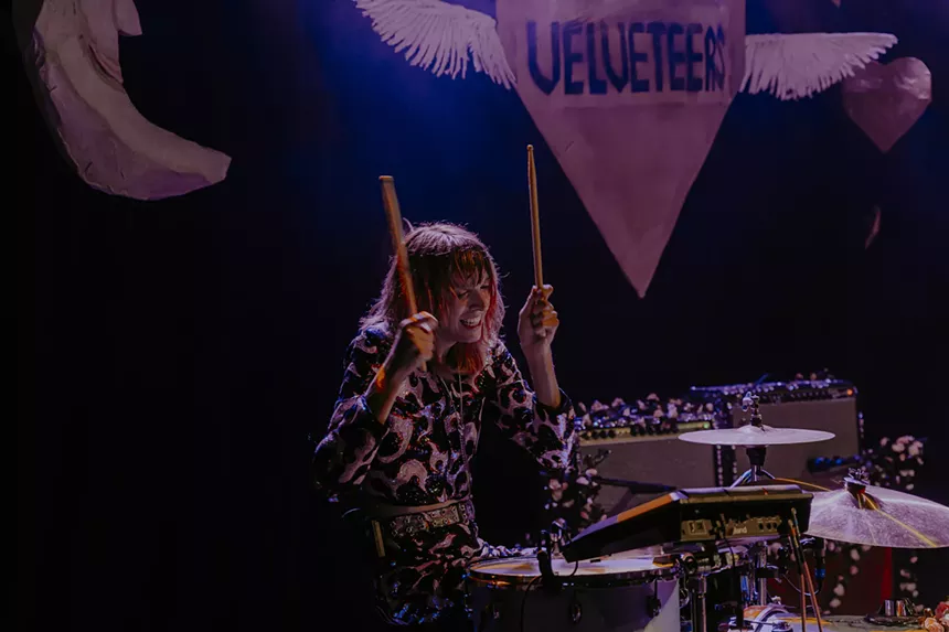 A photo of Baby Pottersmith performing on stage at The Bluebird Theatre.