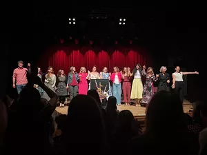 People perform onstage.