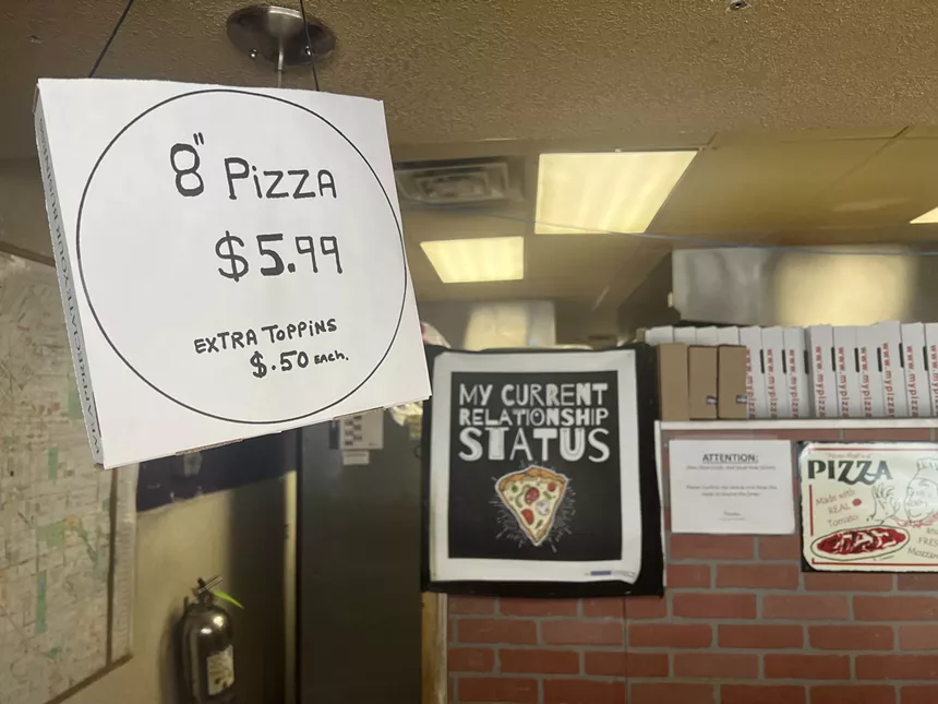 pizza sign and boxes