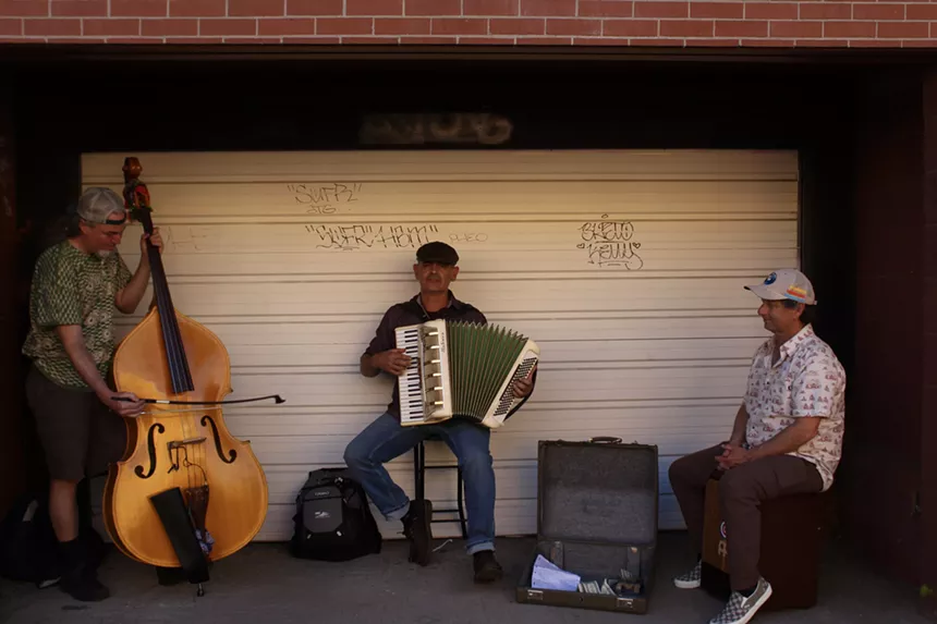 Musicians play instruments