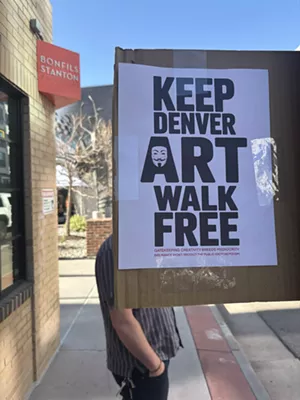 A poster that reads "keep Denver art walk free"
