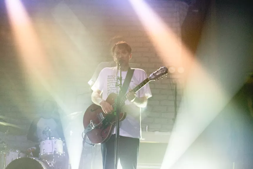 A musician playing on stage