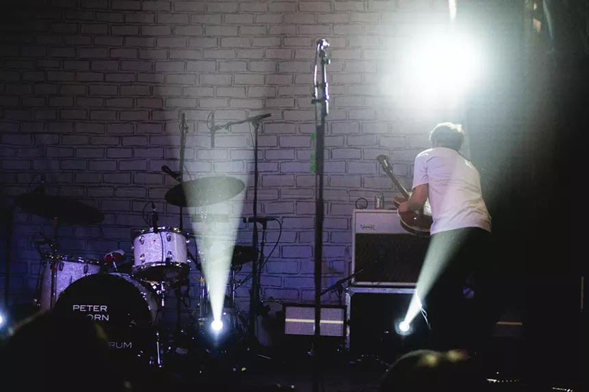 A musician playing on stage
