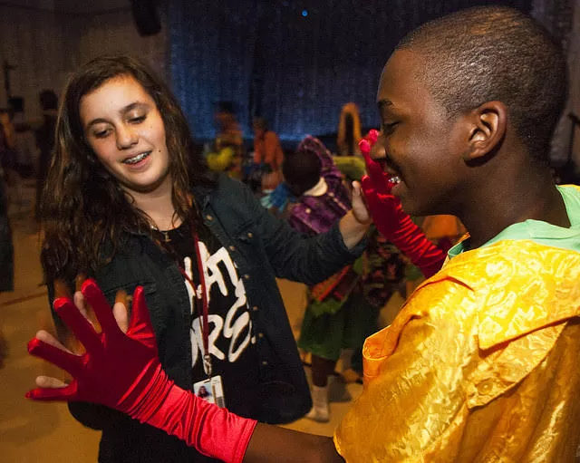 People smile and dance