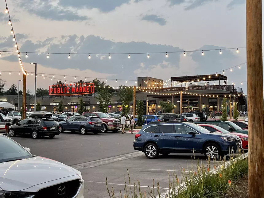 cars parked outside a food hall