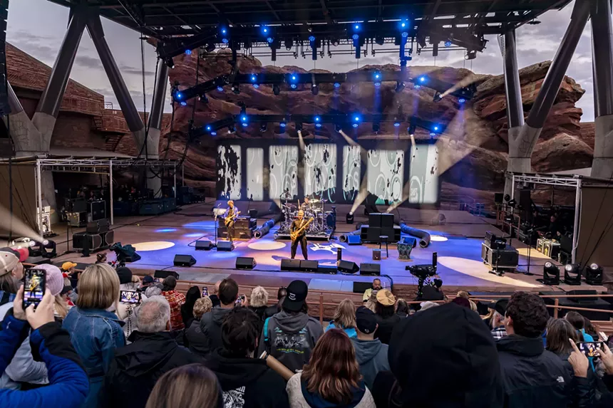 A wide shot of Sting performing at Red Rocks.