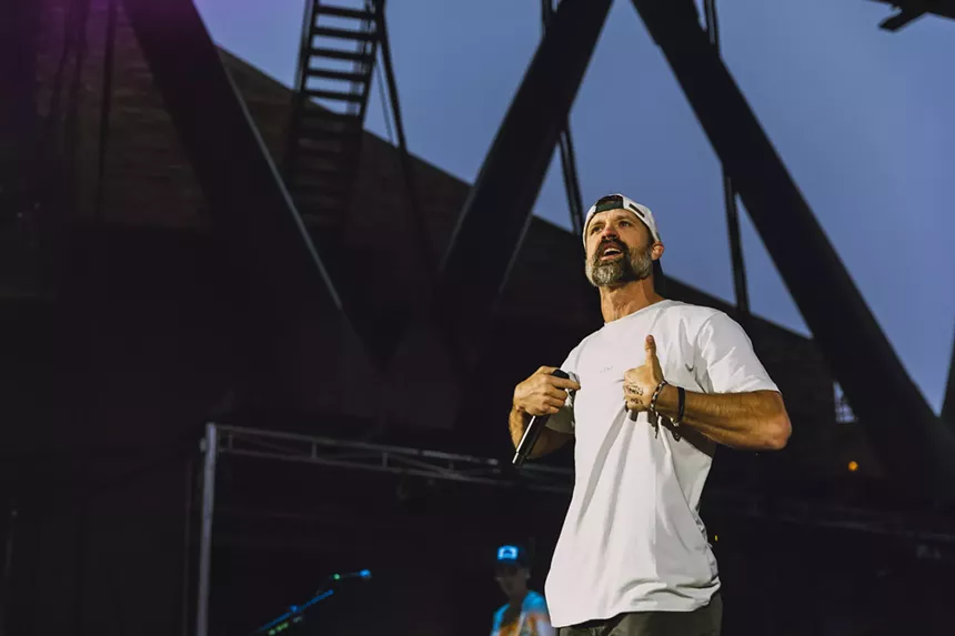 Walker Hayes performing on stage at Red Rocks.