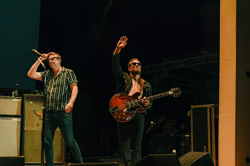 A photo of The Black Keys entering the stage at Red Rocks.