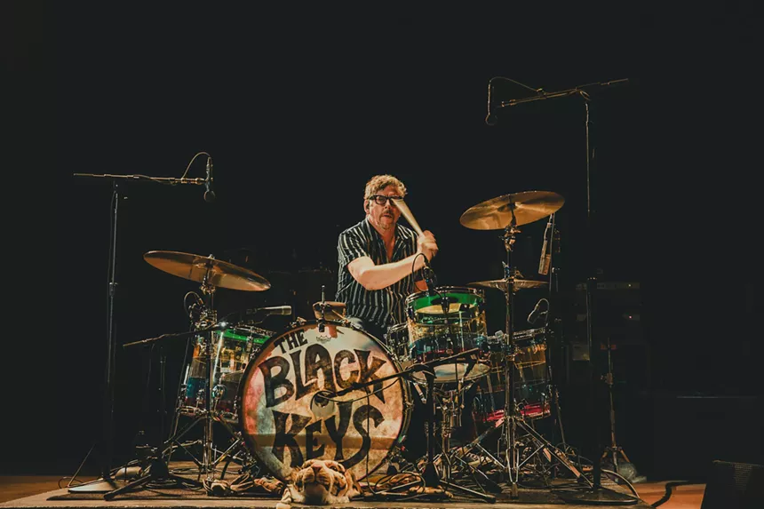 Patrick Carney, of The Black Keys, performing on stage at Red Rocks.