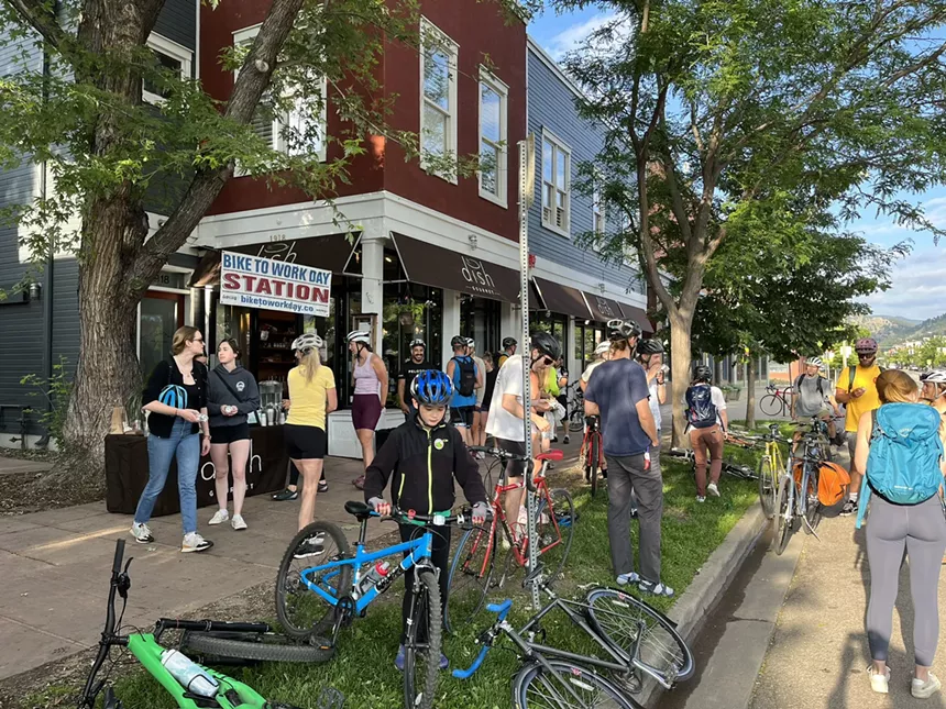 Bikers outside of Dish Gourmet, one of many breakfast stations on Walk and Bike to Work Day