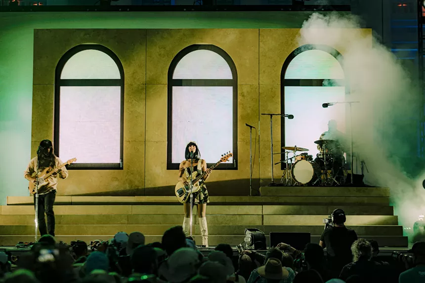 Khruangbin on stage at the Outside Festival.