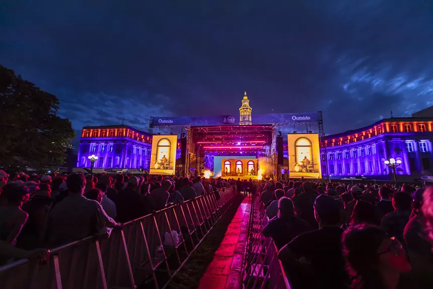 A wide shot of the main stage at night.