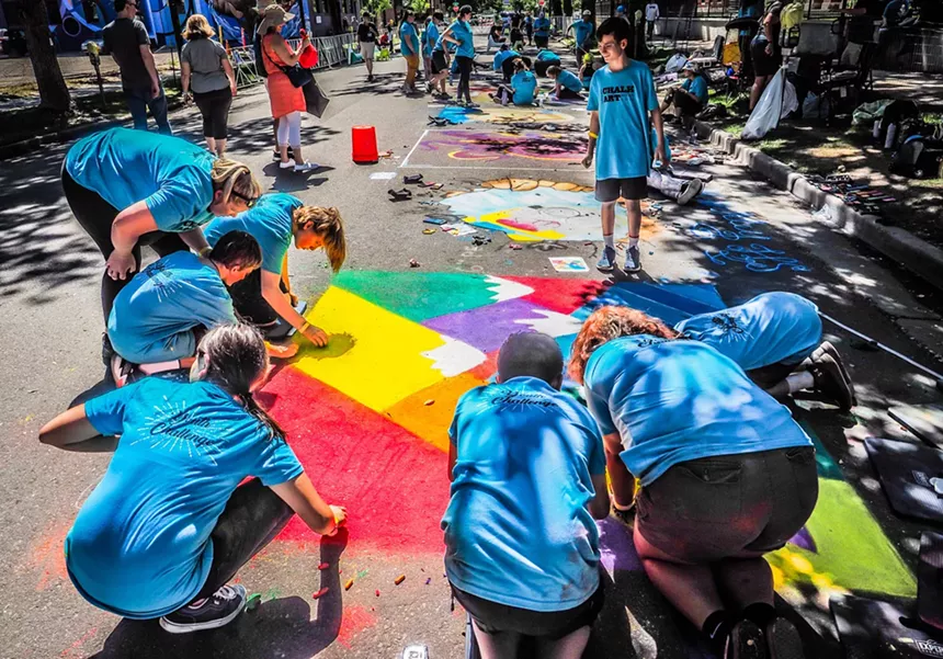People use chalk to create street paintings.