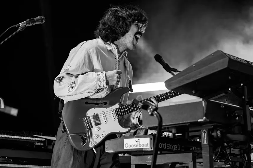 Peter Anspach playing guitar