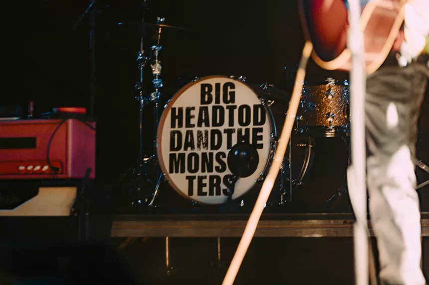 A picture showing Big Head Todd and the Monsters' drum set displaying their band name.