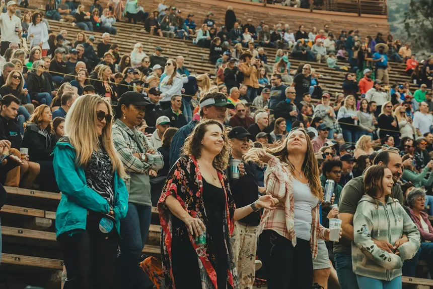 A picture showing fans dancing.