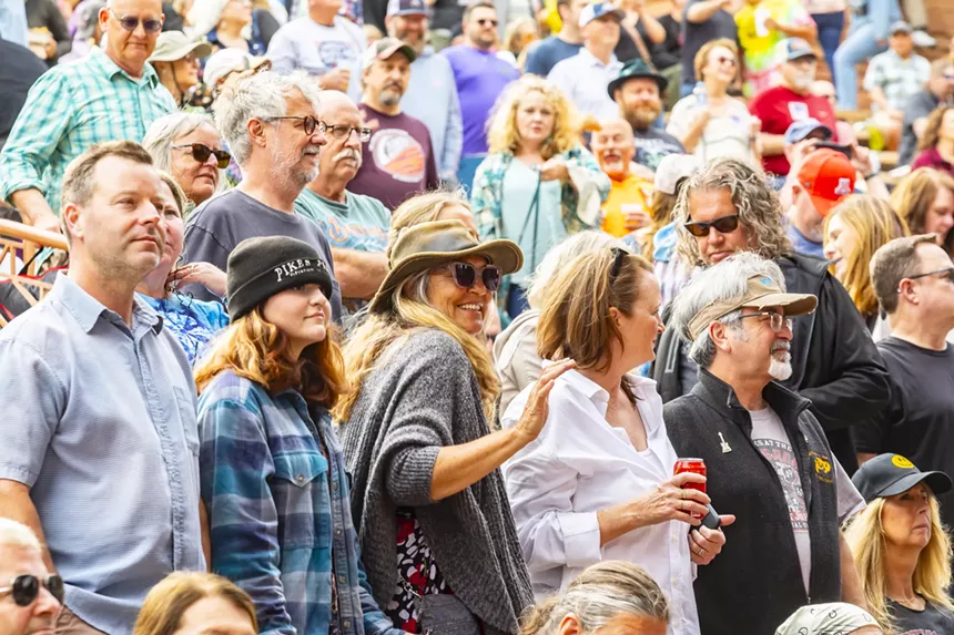 A picture of fans dancing at Red Rocks.