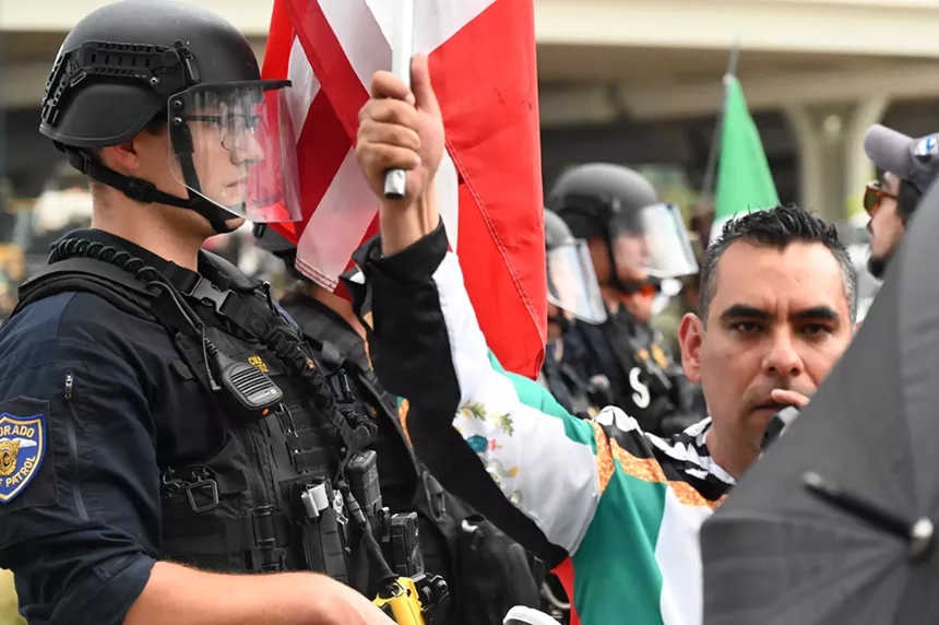 An officer stands still.