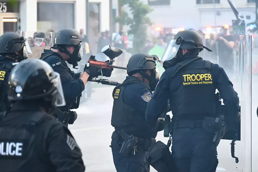 Officers shoot.