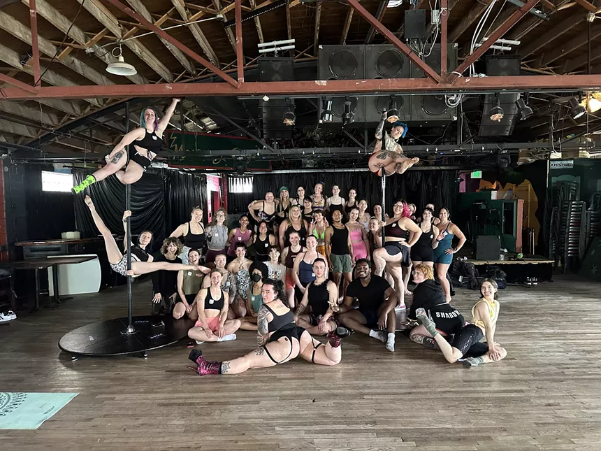 A group photo of the pole class