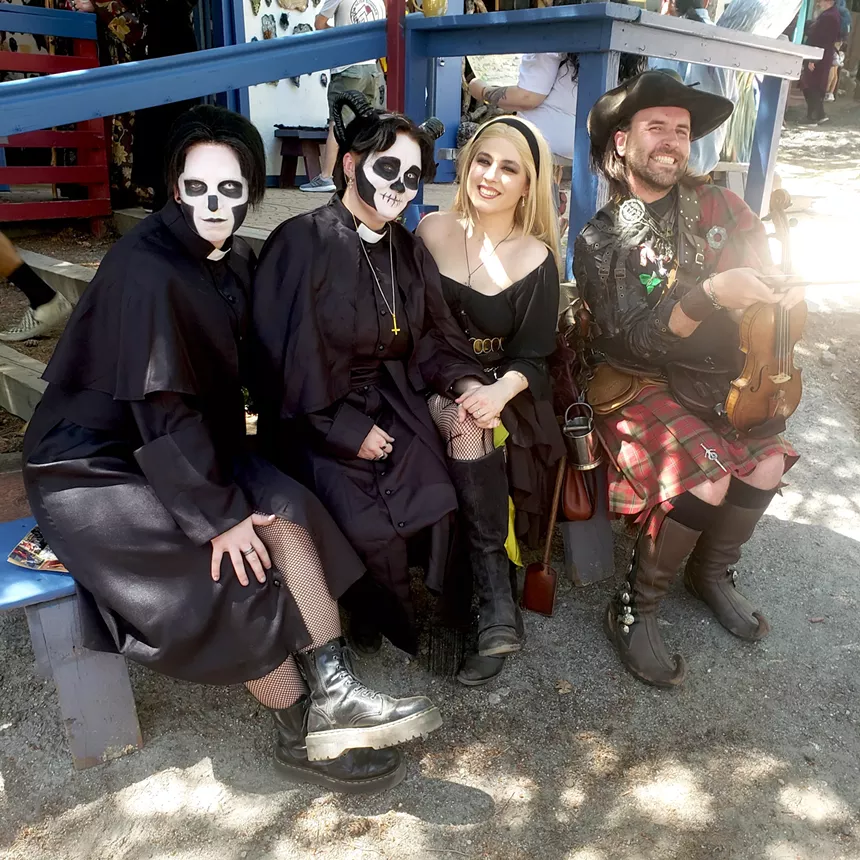 People in Renaissance Festival clothes.