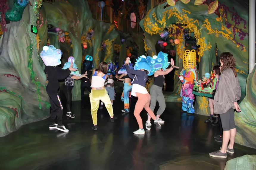 Actors rehearse a scene for an immersive performance at Meow Wolf in Denver.