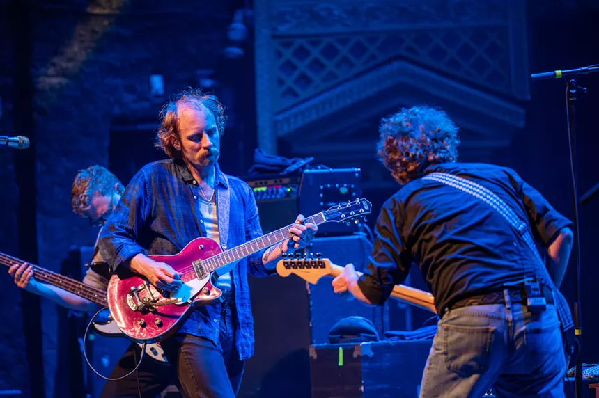 John McCauley playing guitar