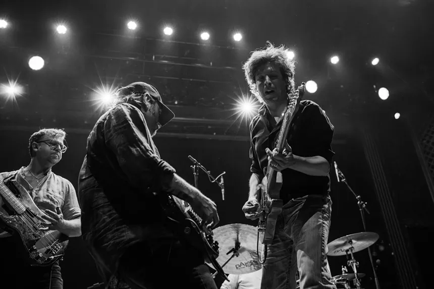 Ian O'Neil playing guitar