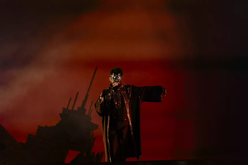 The Weeknd on stage at Empower Field at Mile High for his After Hours Til Dawn Tour on Saturday, June 21.