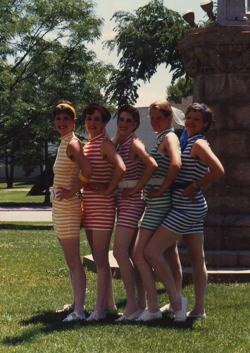 Women in striped dresses